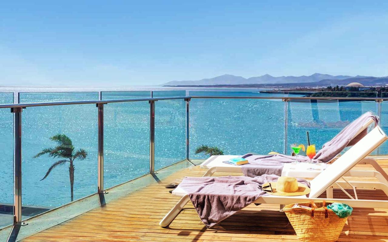 Arrecife Gran Hotel & Spa Exterior photo A glass balustrade
