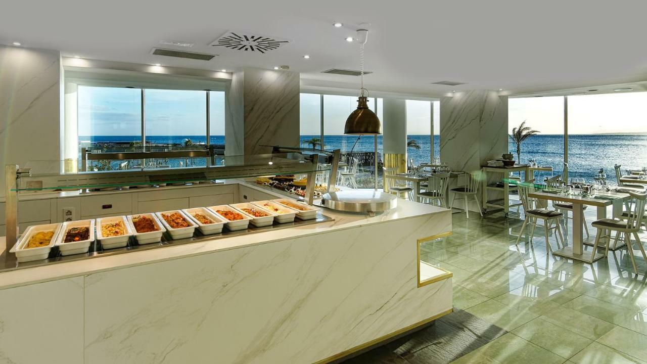 Arrecife Gran Hotel & Spa Exterior photo The buffet at the hotel